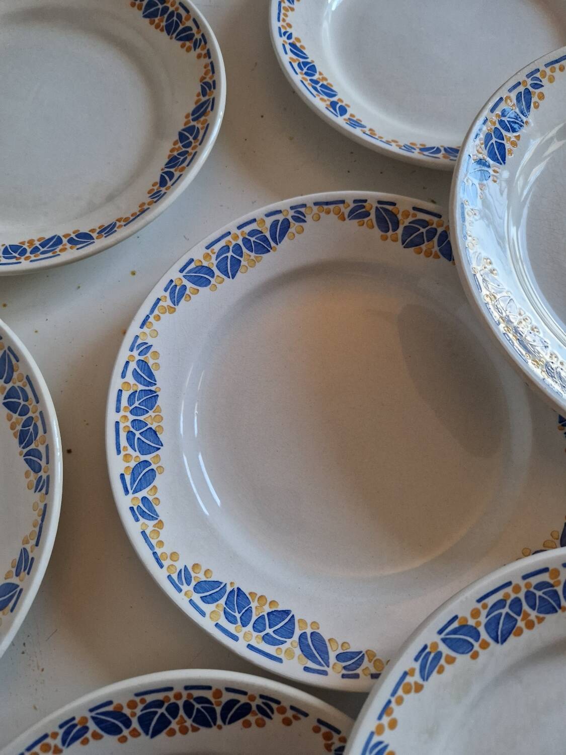 Set of 12 antique Art Deco plates, earthenware from Creil Montereau.