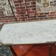 Antique Louis XVI style commode with marble top.