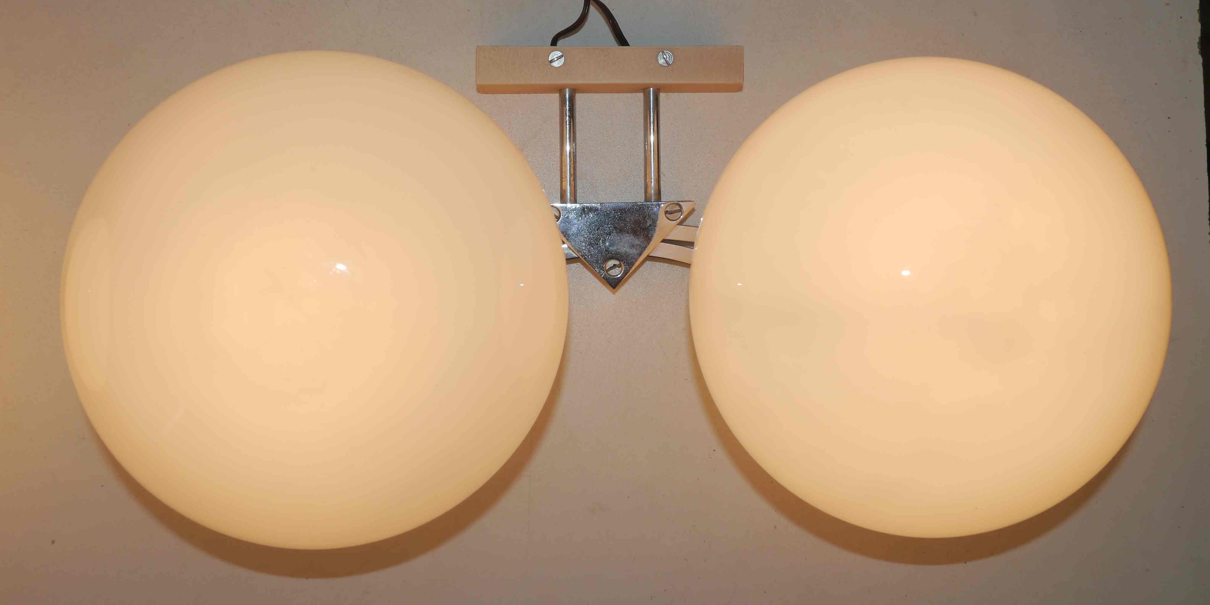 Pair of 60s wall lights in metal and opaline
