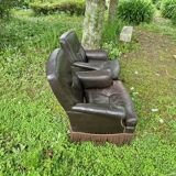 Paire fauteuils en cuir