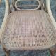 Rocking-chair en bois de cannage