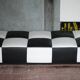 Roche Bobois black and white checkered leather bench, low bench.