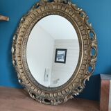 Mirror oval frame carved gilded patinated