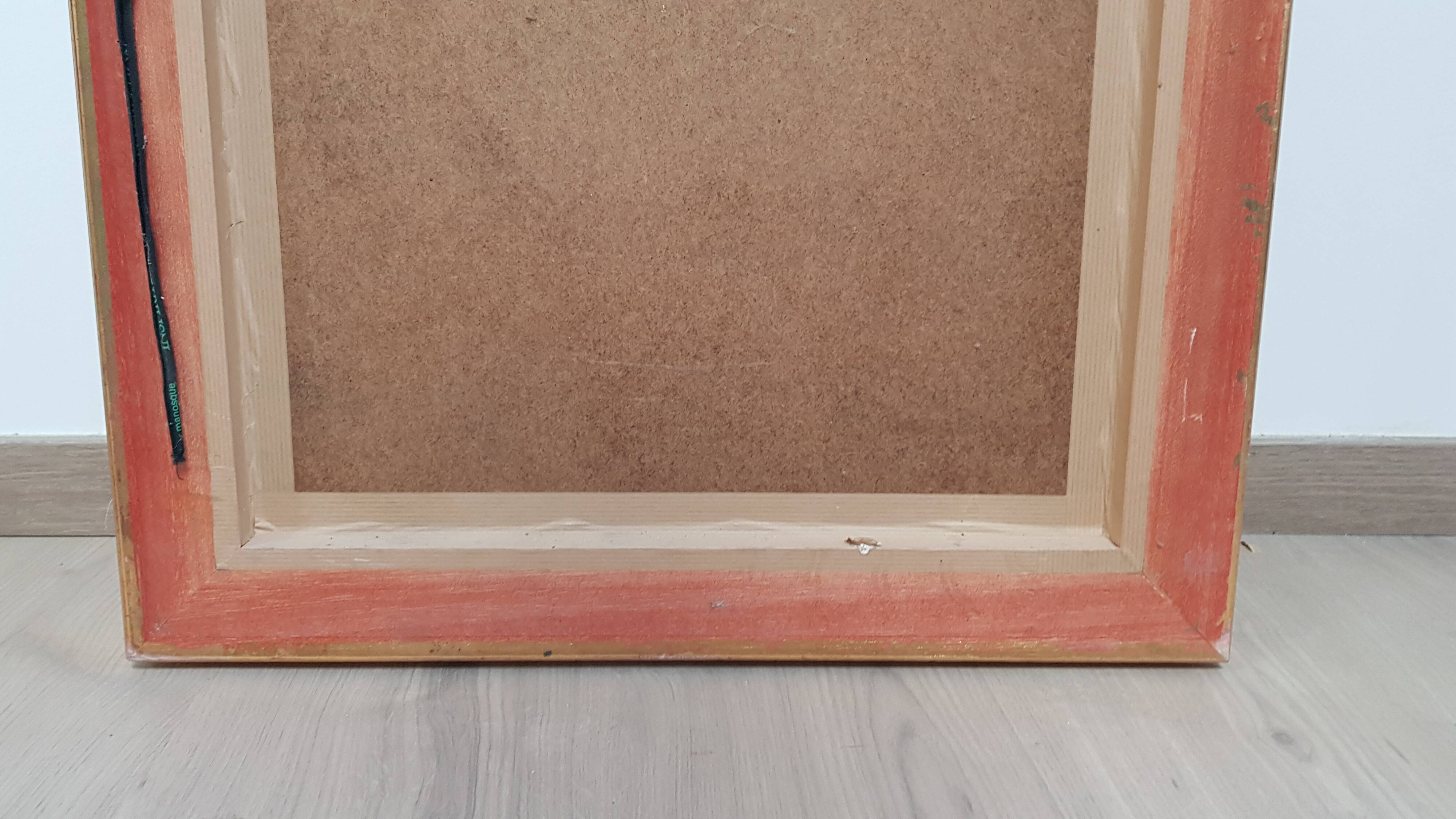 Mirror in gilded stucco wood and beveled glass