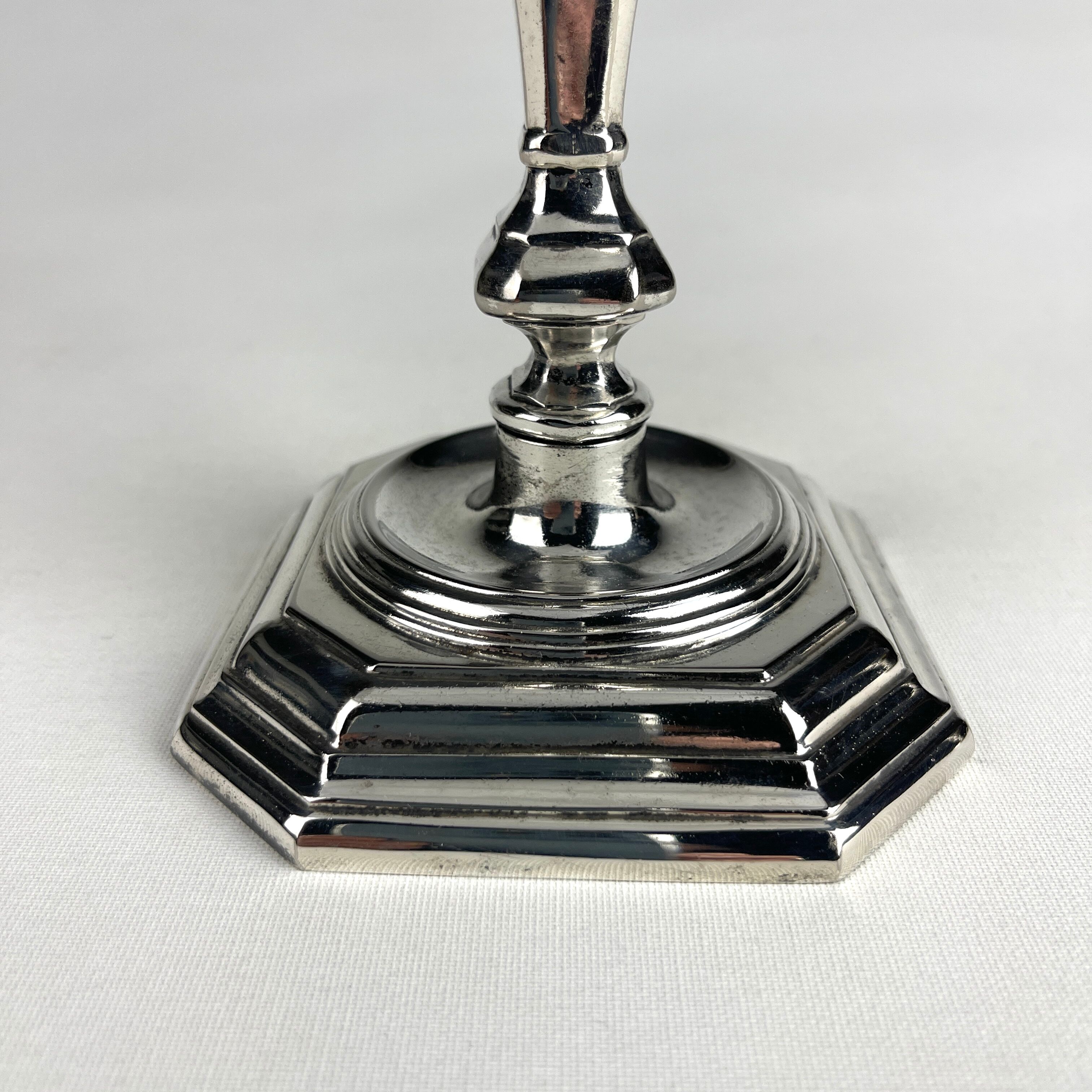 Pair of antique candlesticks in silver metal