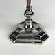 Pair of antique candlesticks in silver metal