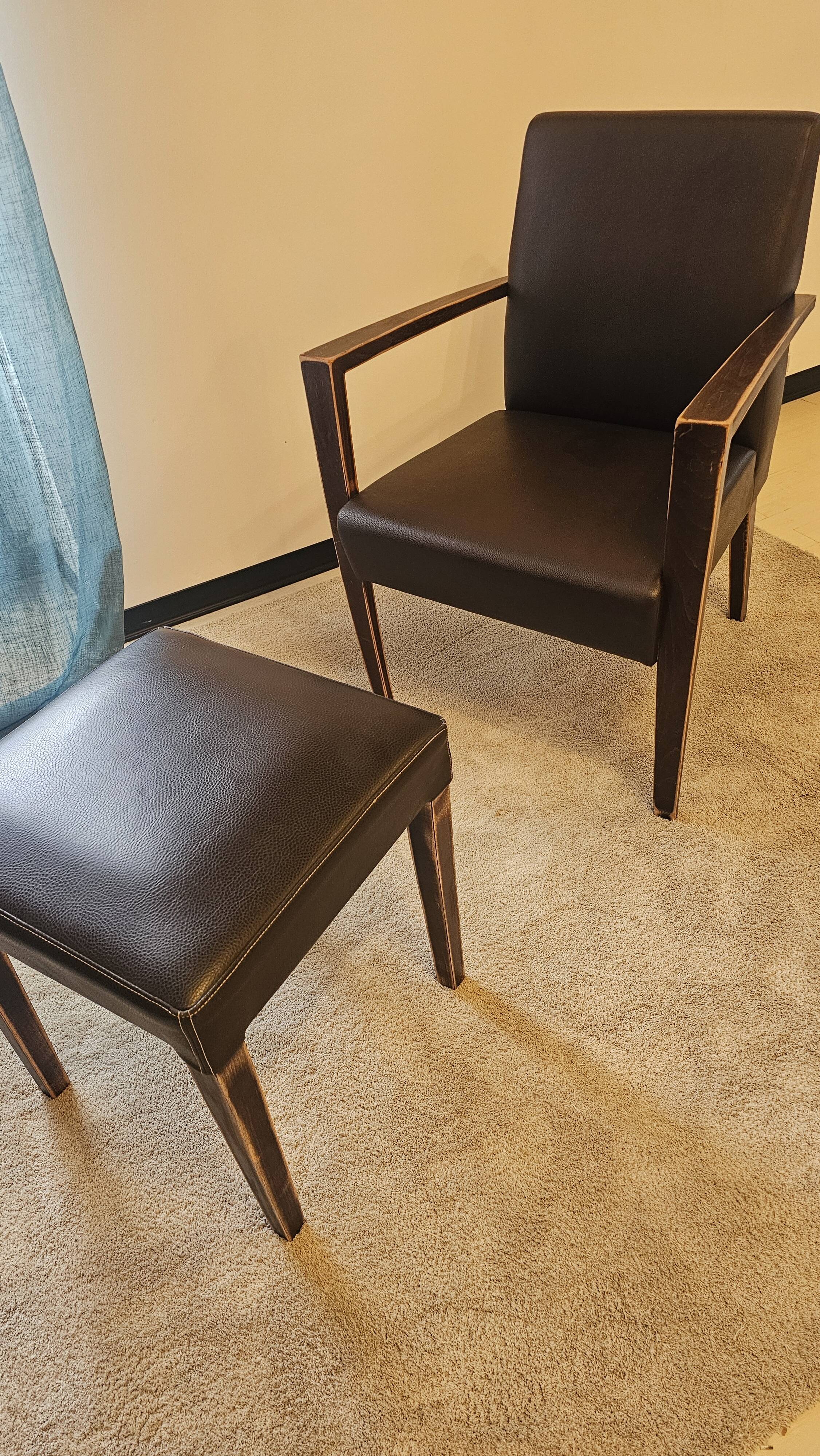 Armchair and faux leather footrest