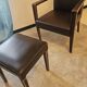 Armchair and faux leather footrest