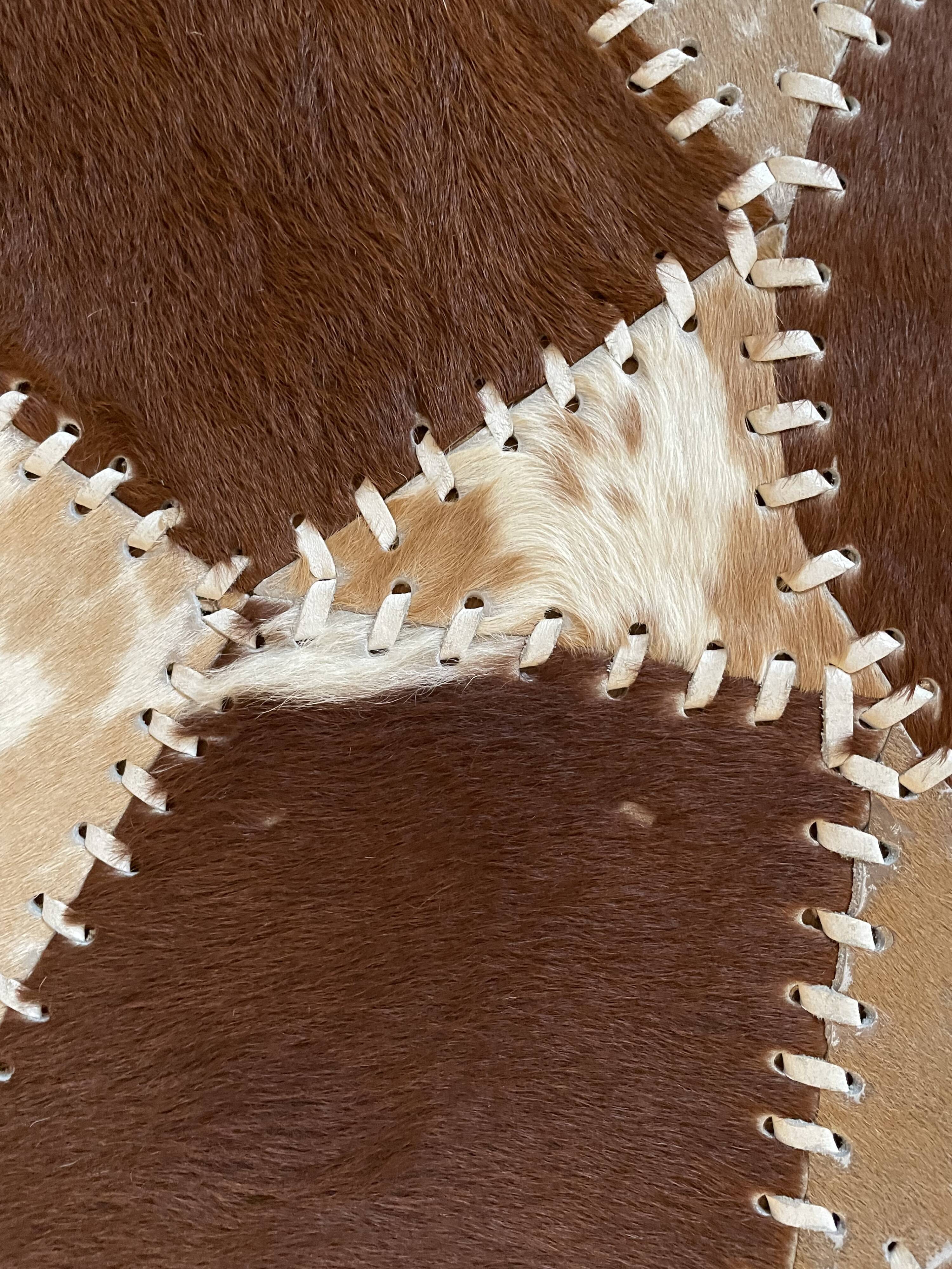 Vintage round cowhide rug 70