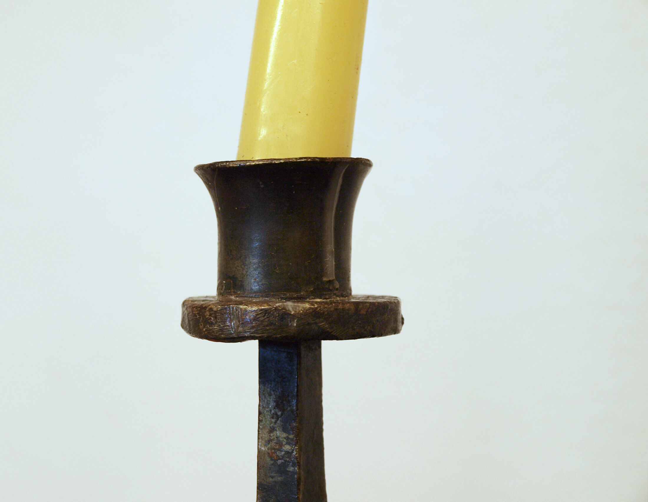 Brutalist wrought iron candle holder beaten