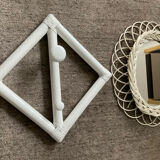 Rattan entrance set with mirror and 2 coat hooks.