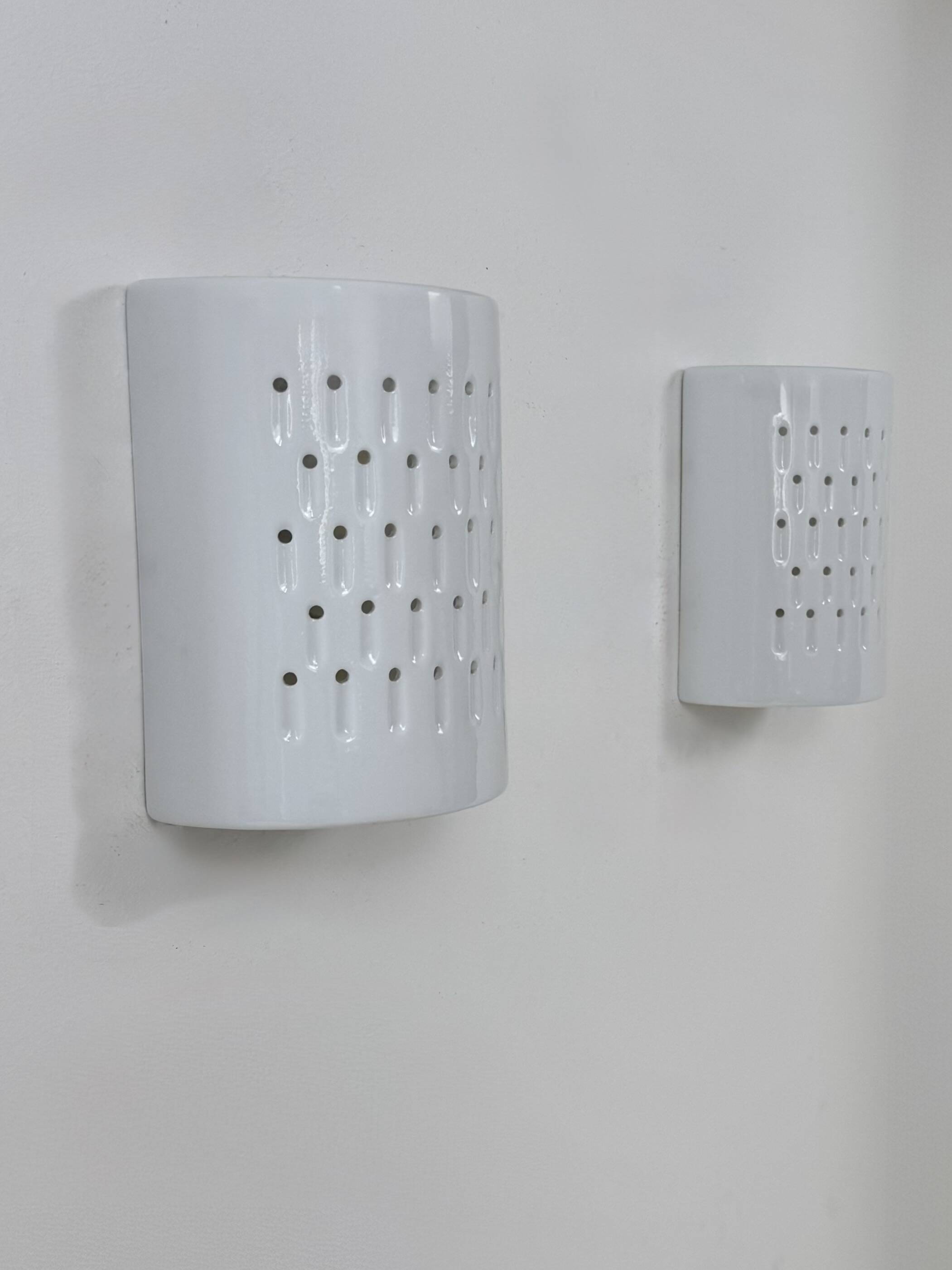 Pair of vintage wall lights in white porcelain, France, 1980.