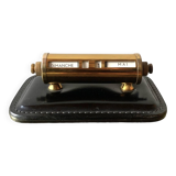 Old perpetual calendar in leather and brass