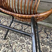 Paire de fauteuils en rotin, pieds métal CIRCA 1950