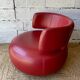 Curl armchair in red leather by Roche Bobois