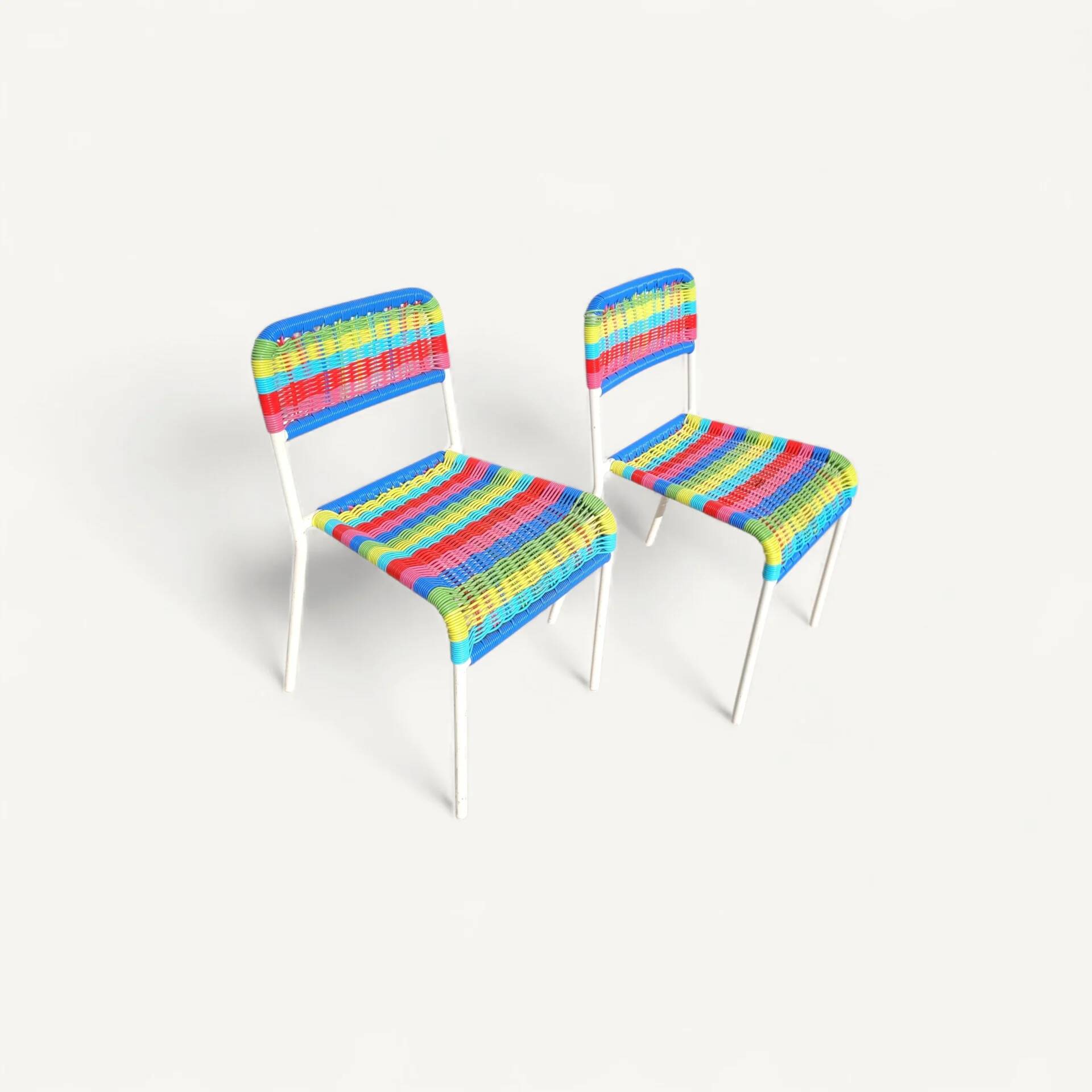 Pair of children's chairs with Ikea Fargglad scoubidou pattern