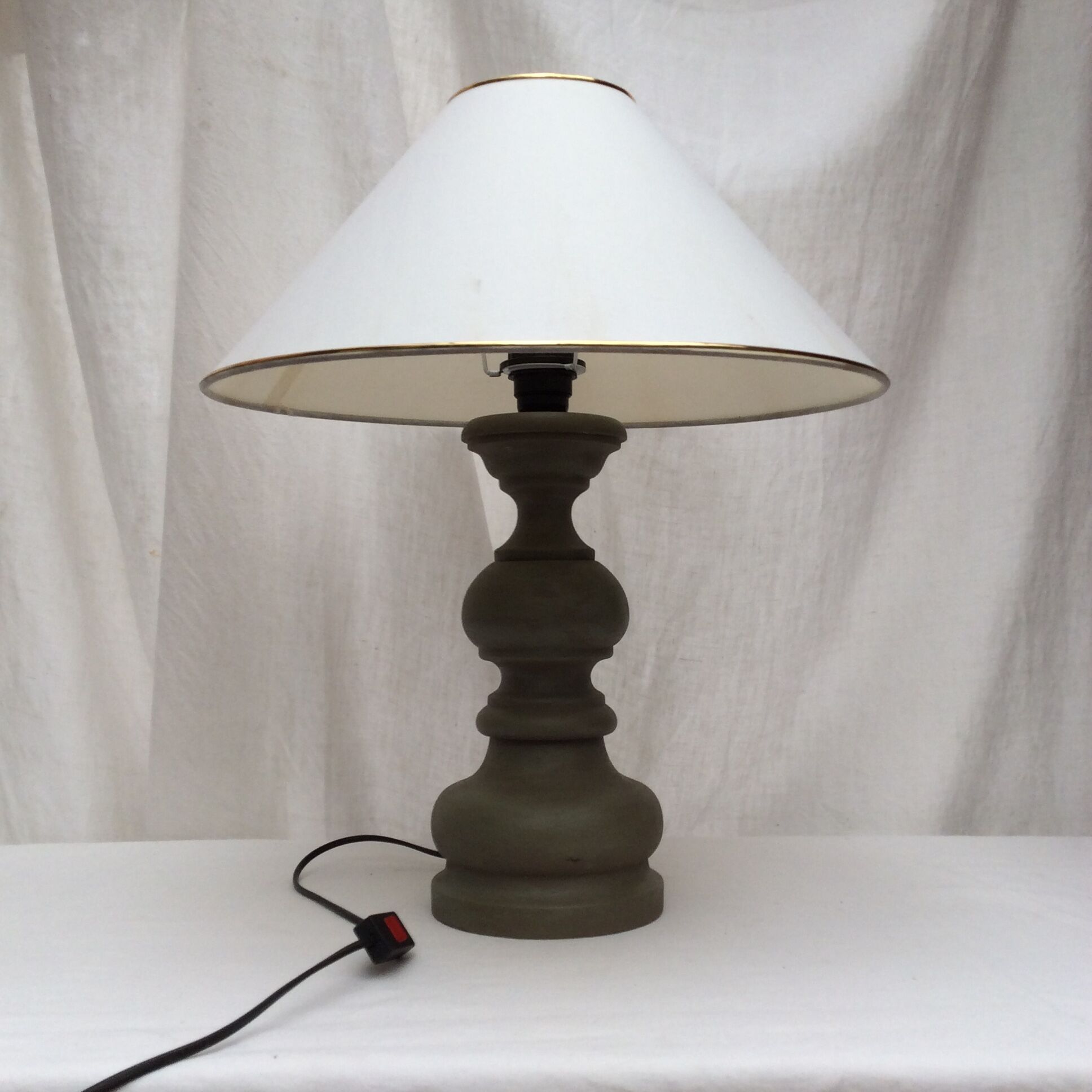 Wooden table lamp in light green color with lampshade