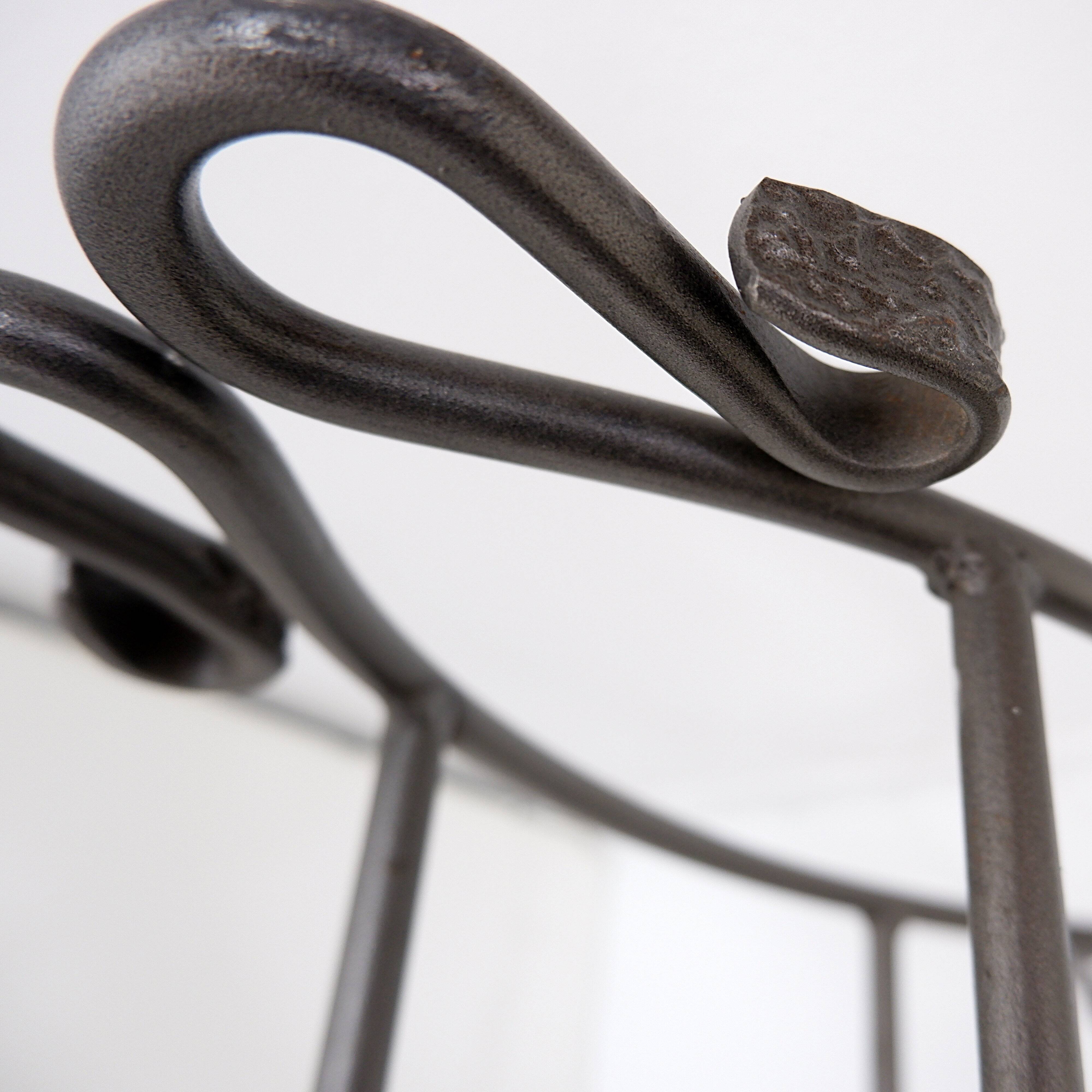 Wrought iron log holder with suede log holder