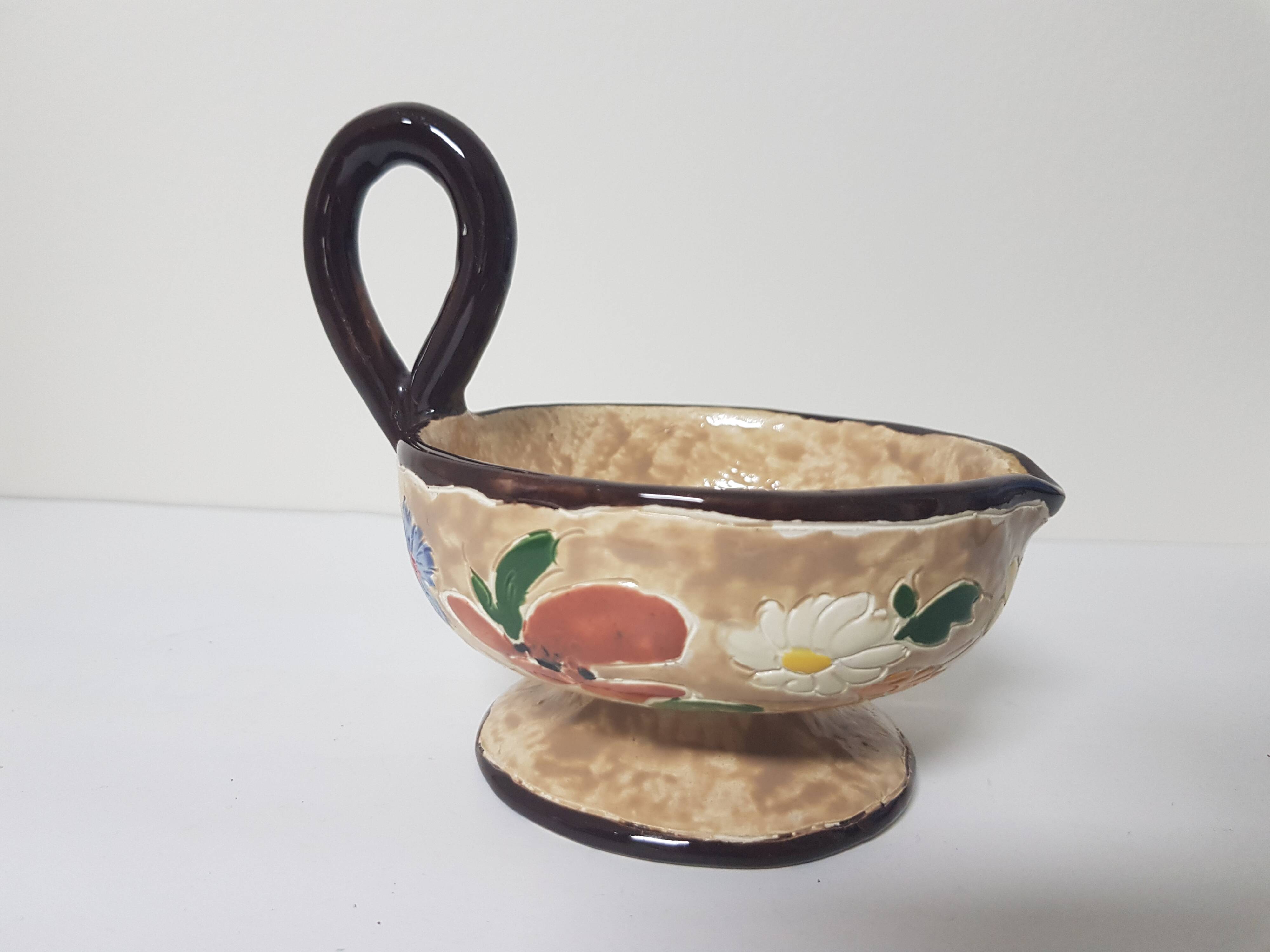 Floral motif ceramic candle holder signed J Massier Vallauris