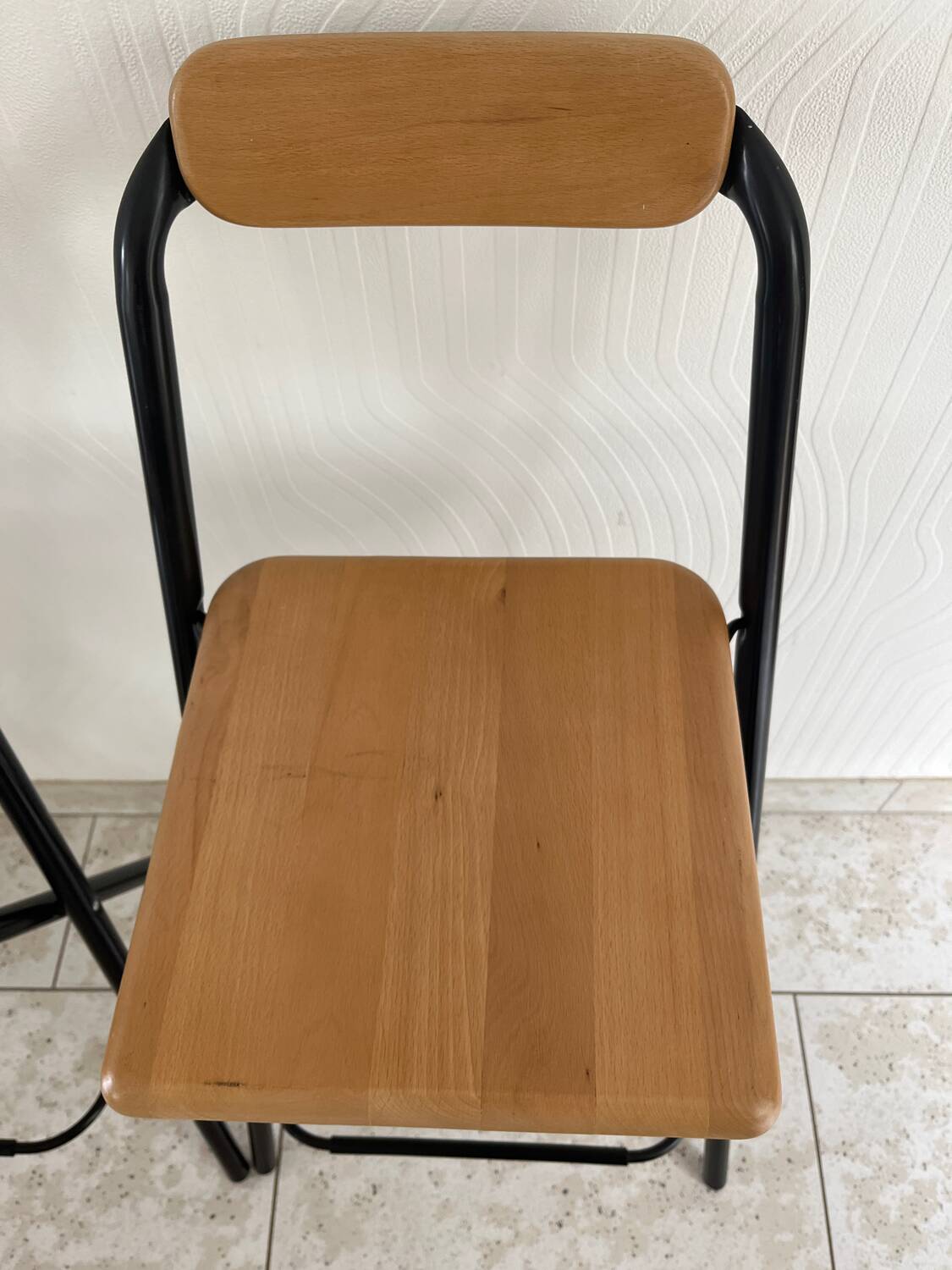 2 foldable bar stools from the 90s in wood and black metal