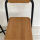 2 foldable bar stools from the 90s in wood and black metal