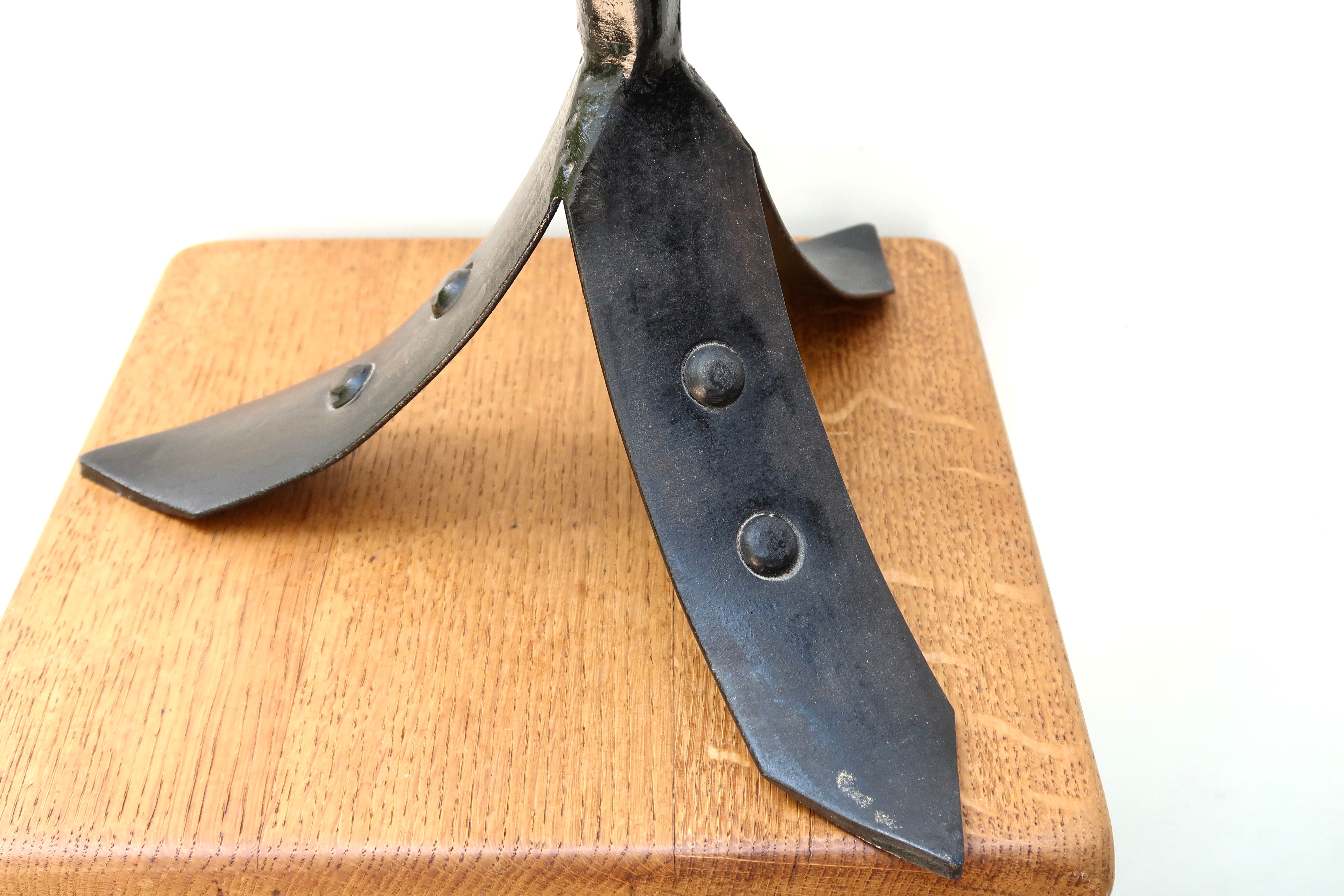 Three-branched wrought iron candle holder, 1950s