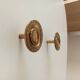 Pair of antique Empire furniture knobs in gilded solid bronze.