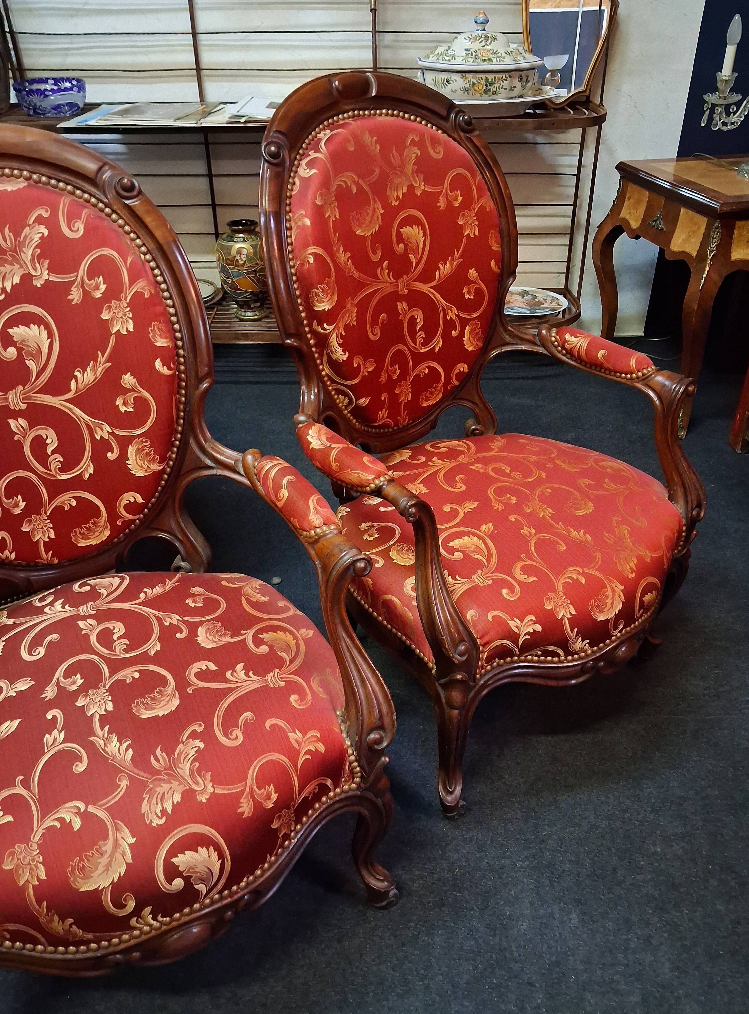 pair of mahogany armchairs, dating from the 19th century