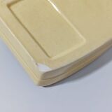 Pale yellow ceramic soap dish