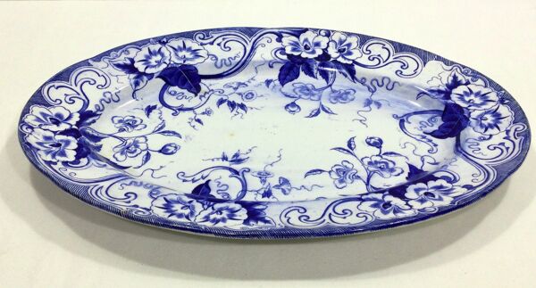 Plat ovale en faience modèle Flora Creil et Montereau