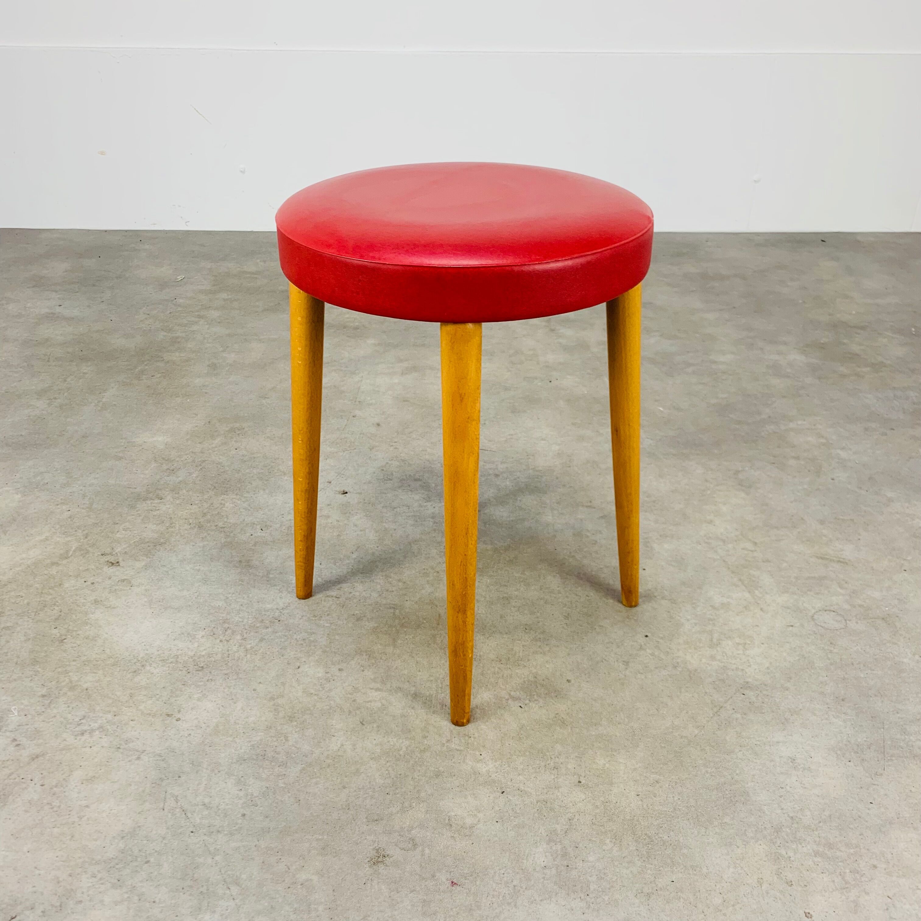Baumann bistro stool wood and imitation red leather 60s