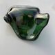 Sculptural ashtray in emerald green glass