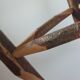 Pair of walnut stools sculpted in a vintage mid-century cross-section.