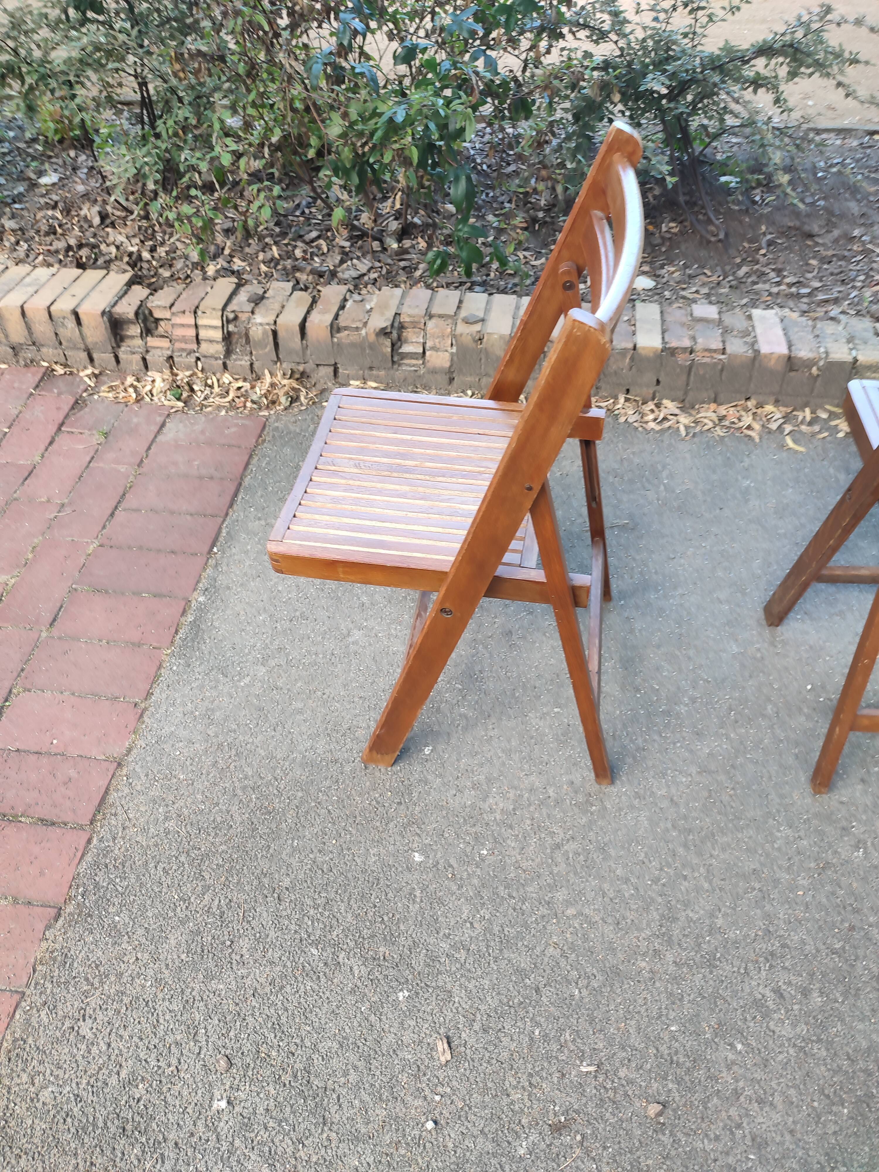 4 folding teak chairs