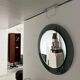 Decorative round wall mirror in smoked glass, Space Age Italian collectible