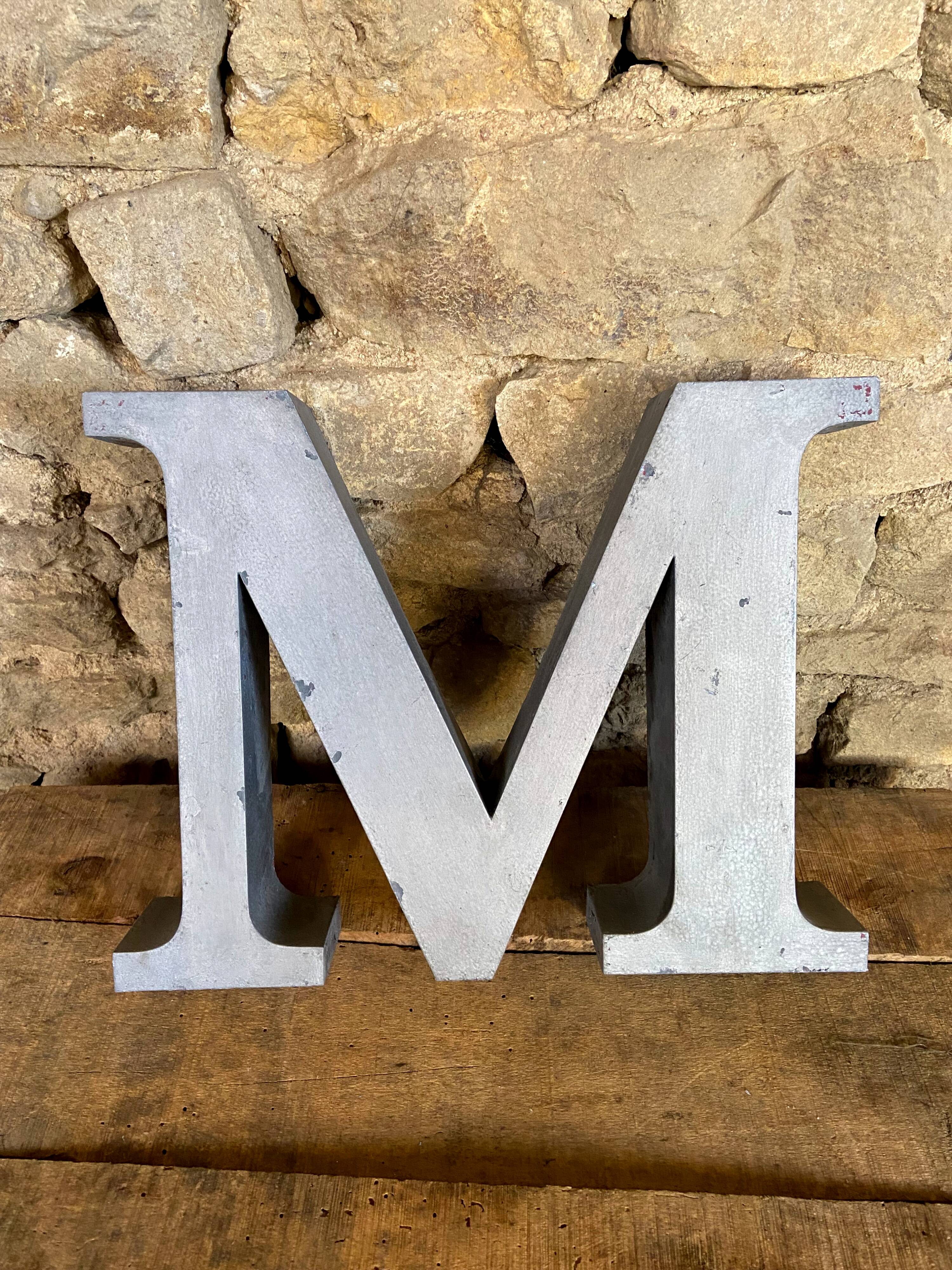 Letter metal - m