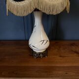 Porcelain lamp in the Indochinese style enhanced with gilding