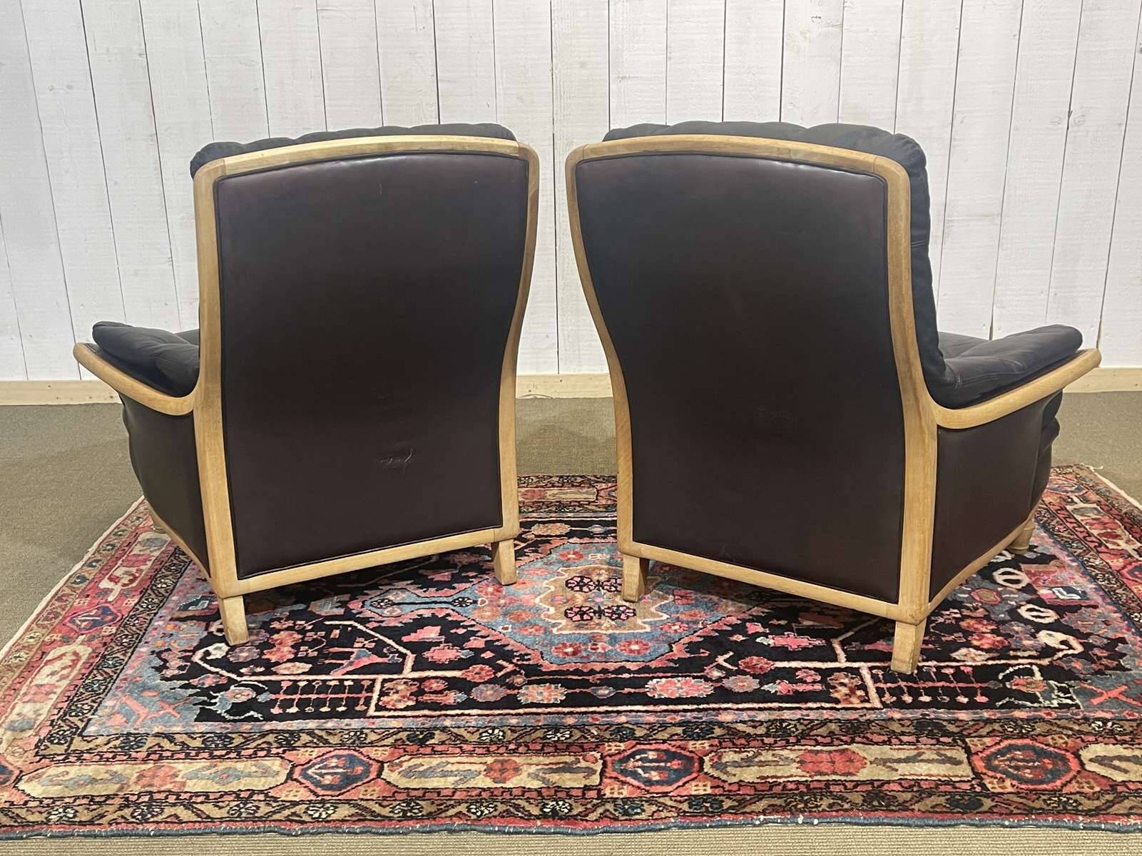 Pair of leather and beech armchairs from the 1970s.