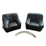 Pair of black leather armchairs from the 80s