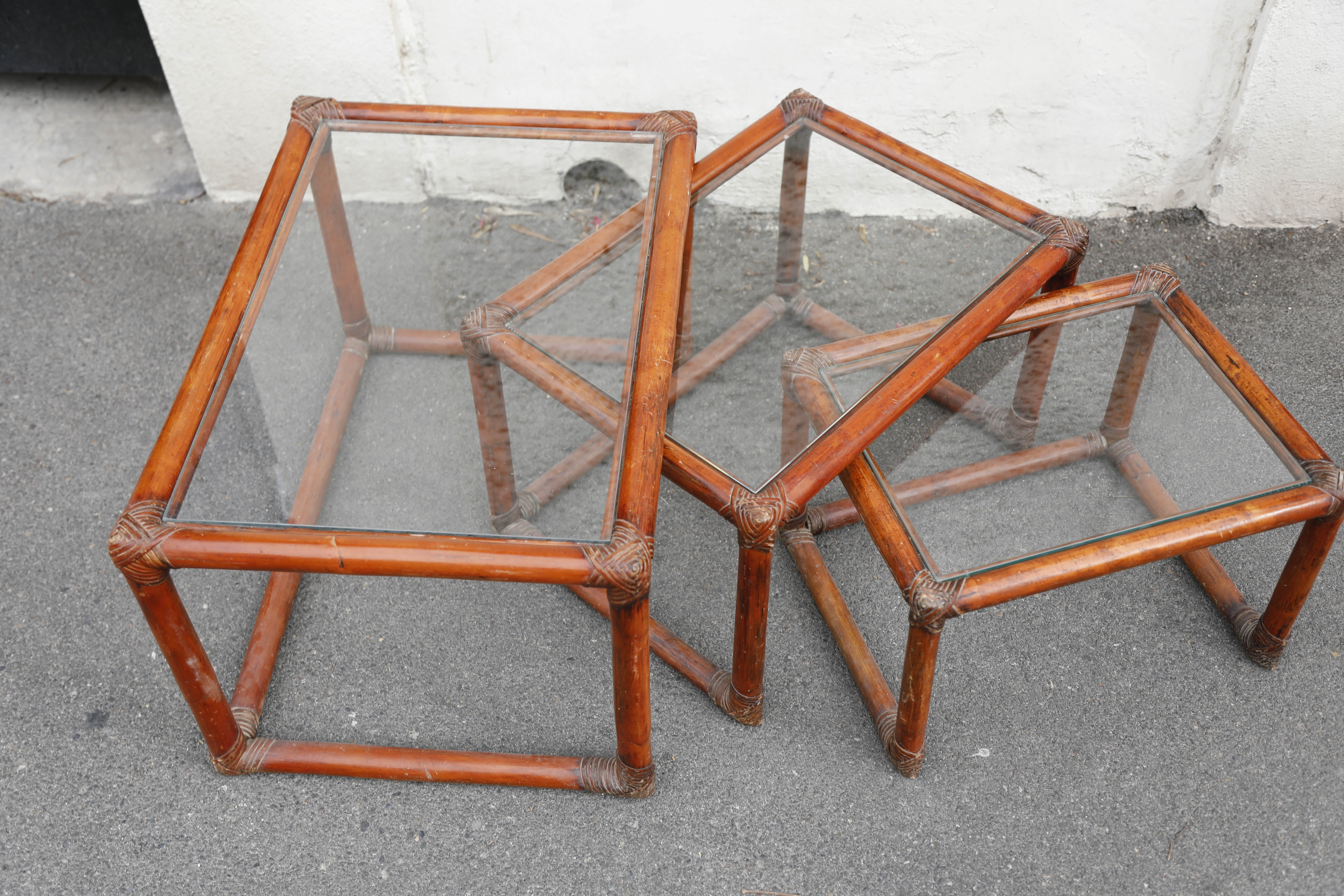 Rattan and glass side tables