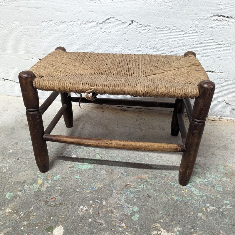 Wooden foot stool and straw