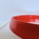 Pair of vintage round red plastic mirrors