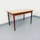 Rectangular dining table in vintage Scandinavian style made of teak and melamine.