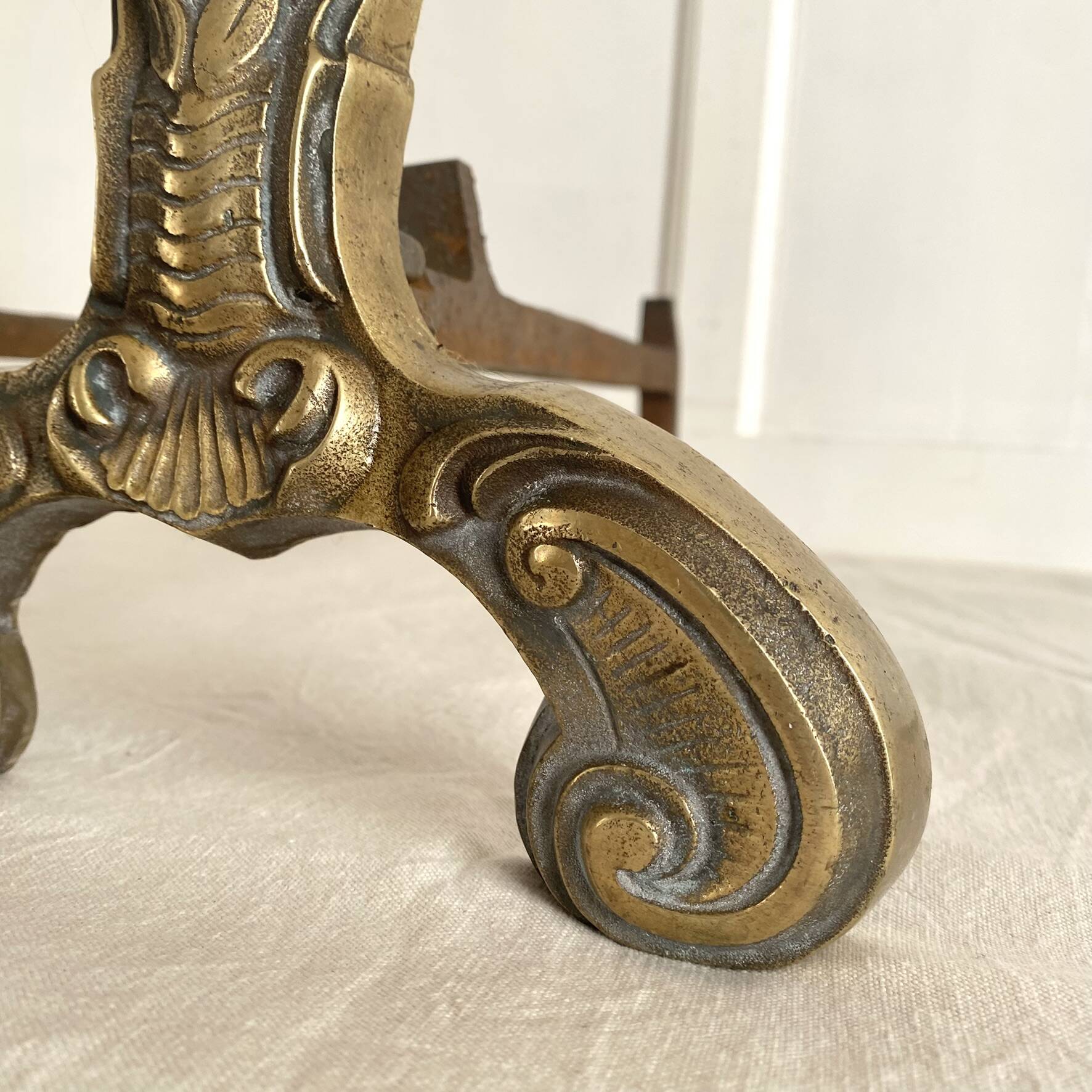 Pair of brass and cast iron fire dogs