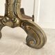 Pair of brass and cast iron fire dogs