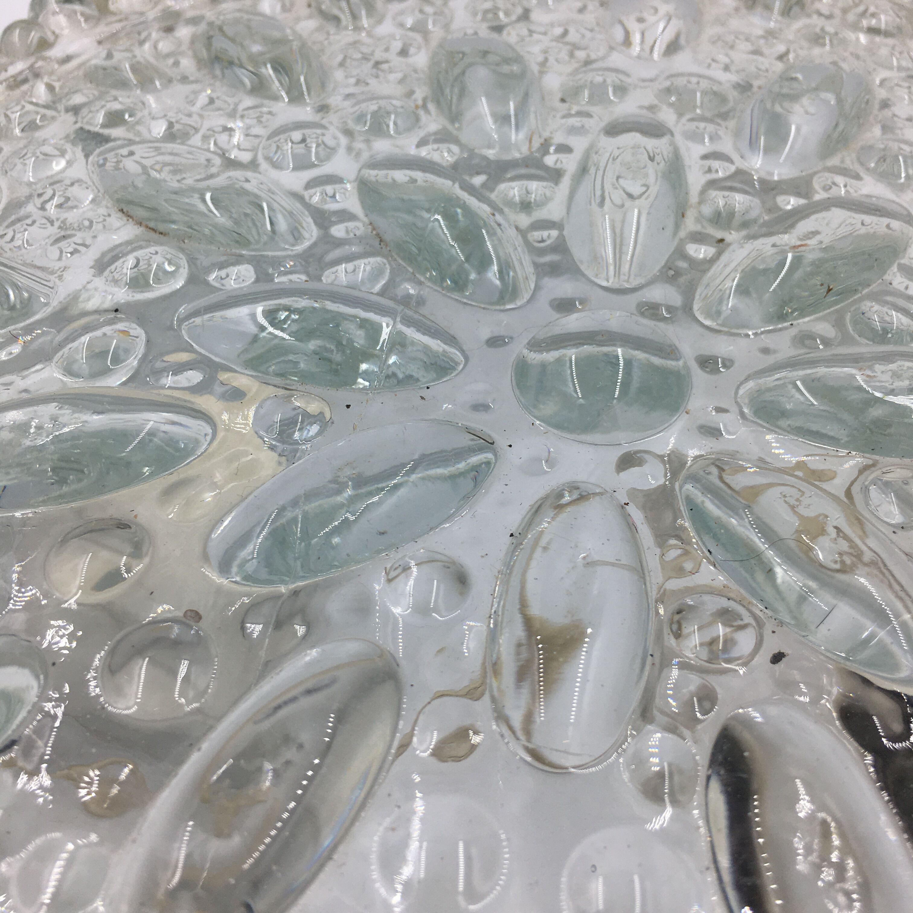 Round ceiling lamp in molded glass with relief