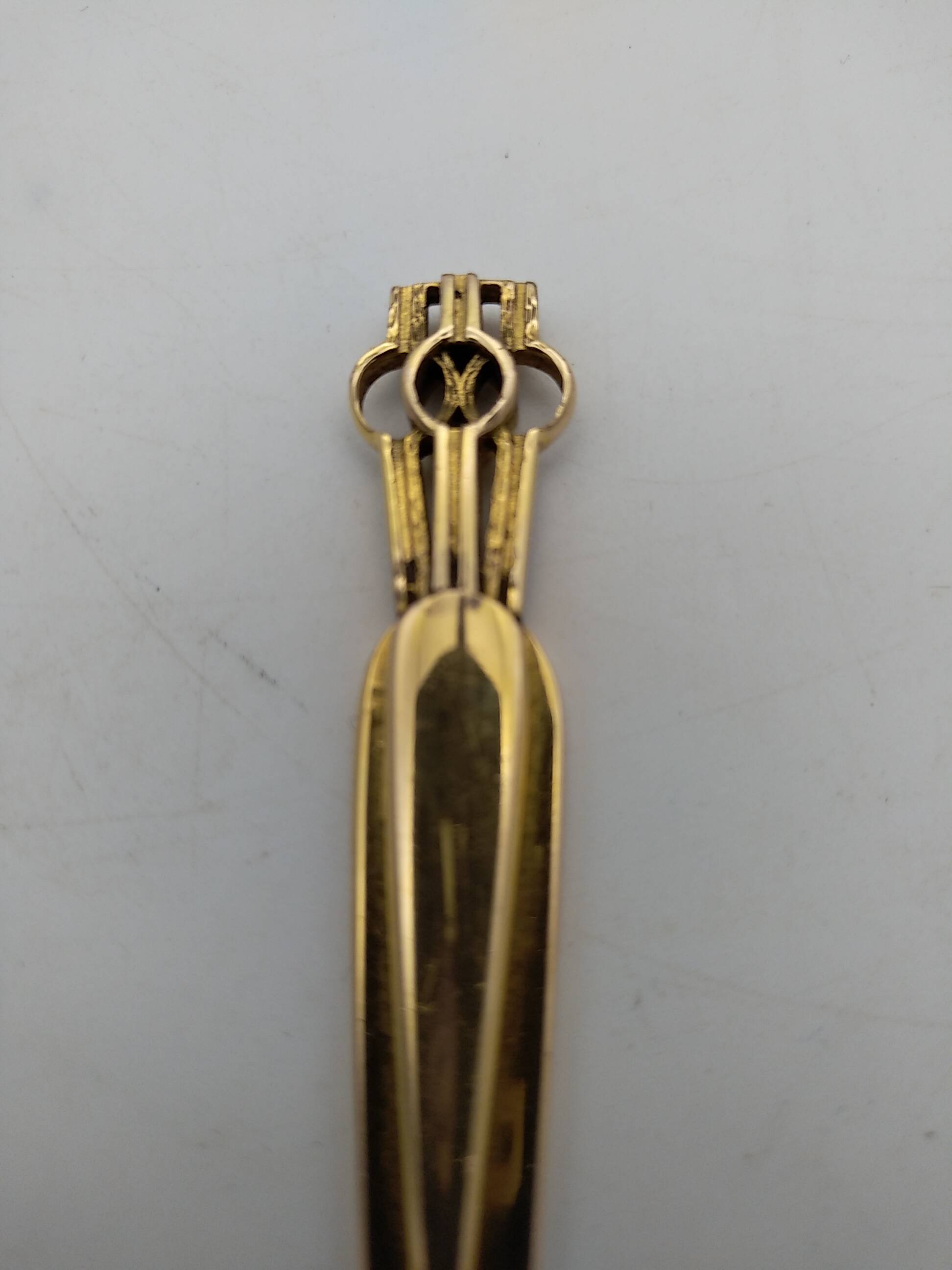 Gold plated letter opener.