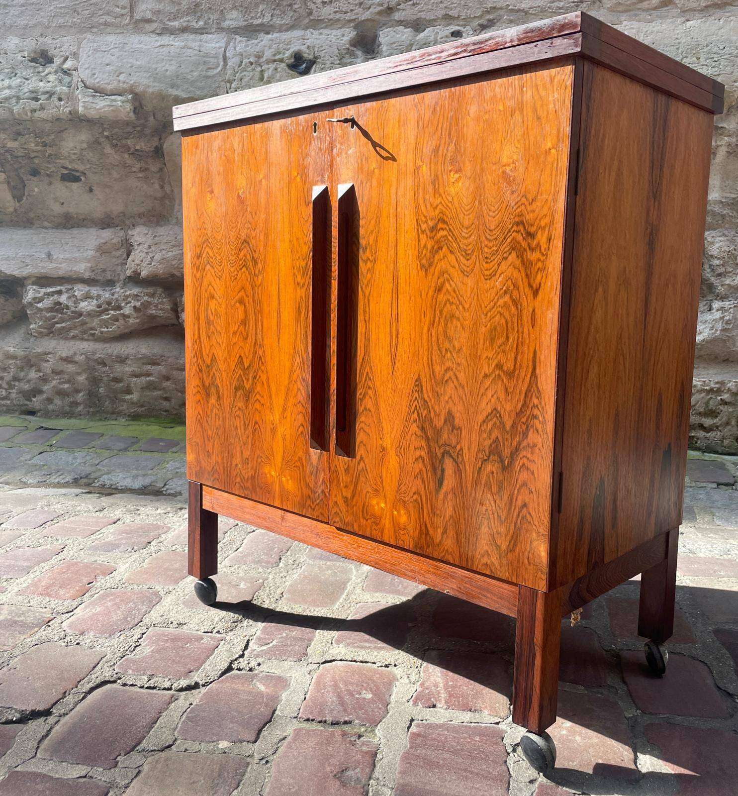 Rolling bar in Rio rosewood by Torbjorn Afdal for Bruksbo