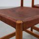 Pair of wood and leather Spanish chairs by Jordi Vilanova, ca. 1960