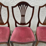 Set of 6 wooden chairs sitting red